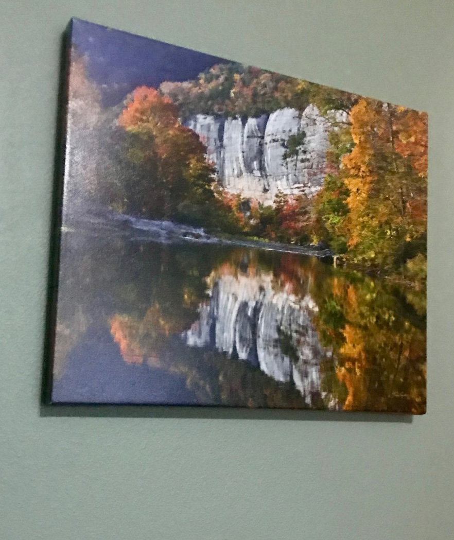 An image of a photograph on canvas by Tim Ernst in the wall of my home.